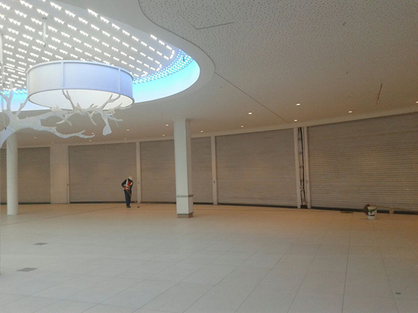 cresta-mall--white-perforated-roller-doors